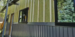 Yellow insulation is visible on unfinished home.